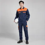 Áo phông đồng phục vải kaki cotton màu xanh phối cam dài tay túi hộp